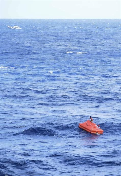 Cruise Ship Rescues Passengers From Sinking Yacht [PHOTOS]