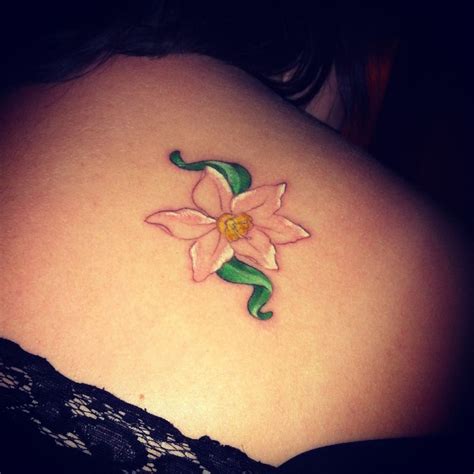 tattoos - BabyCenter | Narcissus flower tattoos, Flower tattoo shoulder, Birth flower tattoos