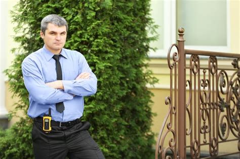 Premium Photo | Male security guard in park