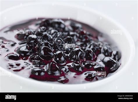 Fresh homemade jam made of Patagonian Calafate berries (lat. Berberis heterophylla), served in ...