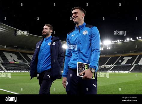 Wigan Athletic's Nick Powell and Owen Evans ahead of the match Stock Photo - Alamy