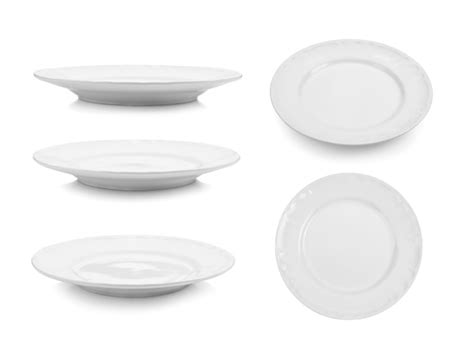 Premium Photo | Directly above shot of ceramic plates against white background