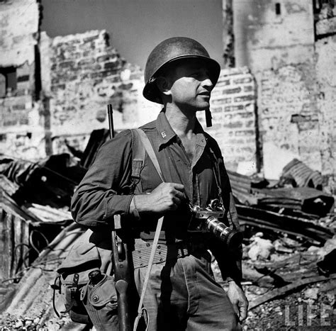 LIFE Magazine photographer and war correspondent Carl Mydans with a ...