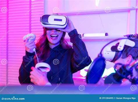 Two Professional Gamer Playing Games through VR Machine Stock Image - Image of modern, glasses ...