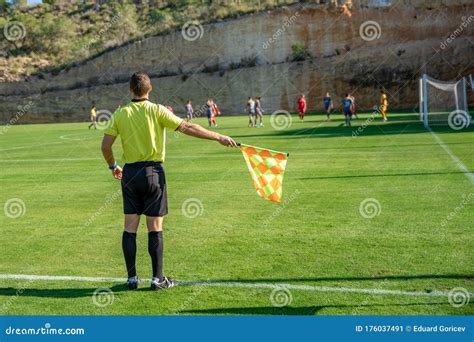 Assistant Referee in a Football Match Watching the Game Editorial Photo - Image of pitch ...