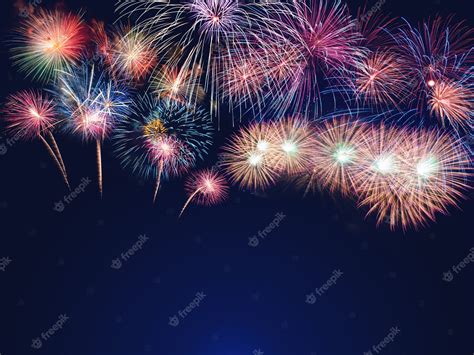 Premium Photo | Colorful fireworks on the black sky background with ...