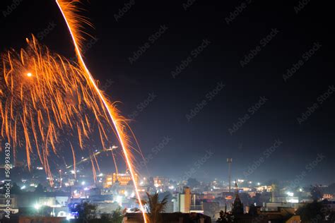 Wide angle shot of fire works in the city during the Diwali festival in ...