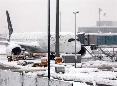 Snowstorm brings Munich airport to standstill and hits travel in ...