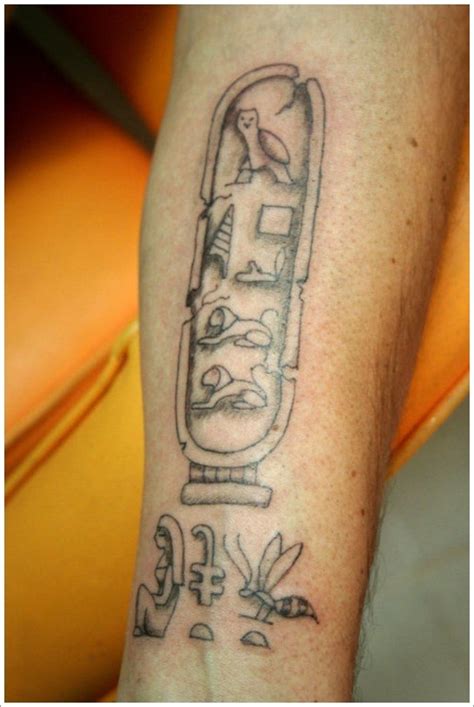 Cartouche and egyptian hieroglyphs tattoo on arm - Tattooimages.biz