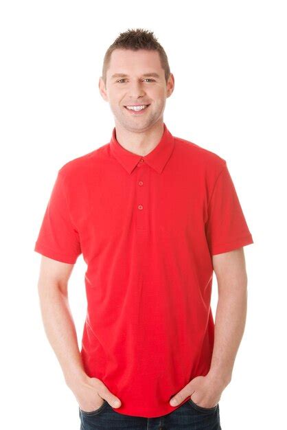 Premium Photo | Portrait of smiling man standing against white background