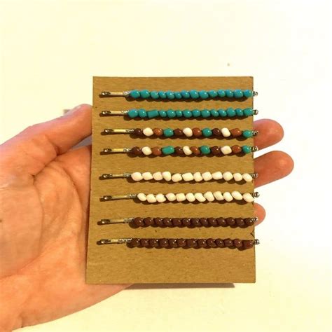 An eight-piece beaded bobby pin set or two-piece turquoise gemstone ...