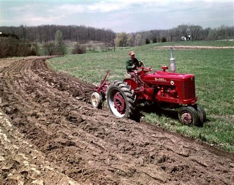 Plowing with McCormick Farmall Super M Tractor | Photograph | Wisconsin ...