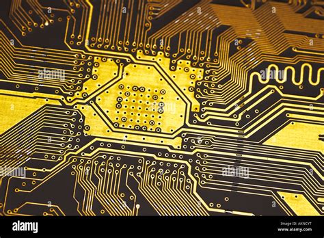 Close up photograph of gold coloured digital computer circuit board Stock Photo - Alamy