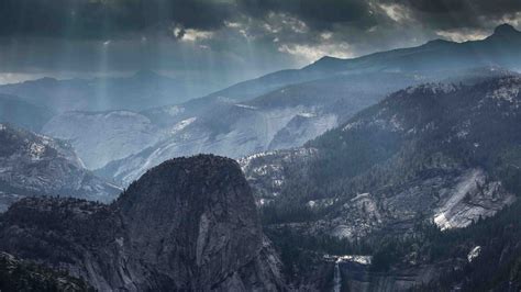 Aerial photography of crepuscular rays over mountains during daytime HD ...