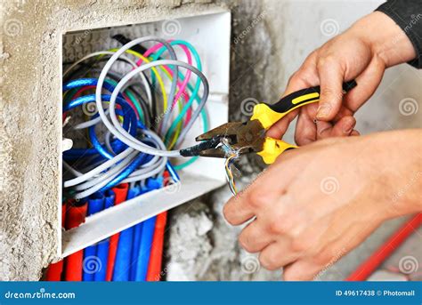 Electrician Installing a Switch Socket Stock Photo - Image of construction, bedroom: 49617438