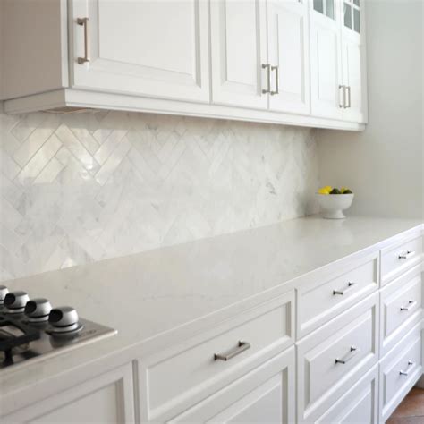 RS Design Management LLC on Instagram: “The Eastern White Marble backsplash defines the look of ...