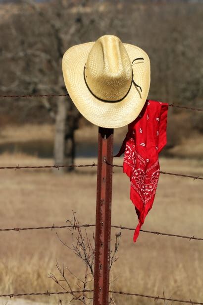 Cowboy Hat And Bandana On Fence Free Stock Photo - Public Domain Pictures