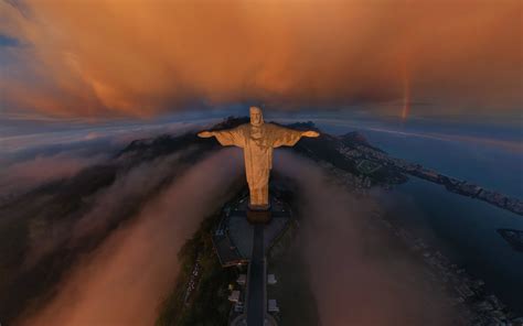 rio de janeiro statue christ the redeemer contrails aerial view ...