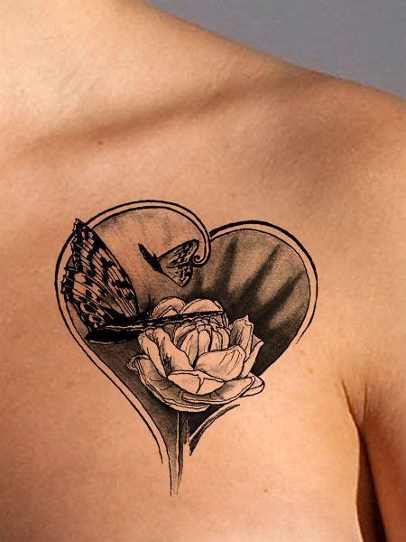 This vibrant, heart shaped butterfly and flower tattoo is available as both a black and a color ...