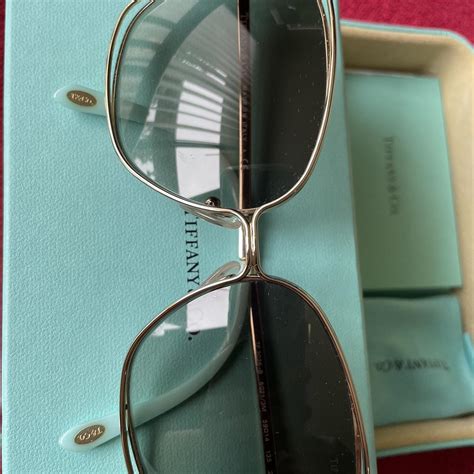 Tiffany & Co. Women's Blue and Black Sunglasses | Depop