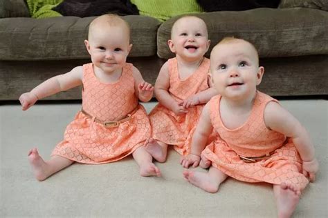 These identical triplets have been colour-coded to help teachers tell ...