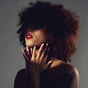 Black woman, red lipstick and shadow with beauty and makeup, hands with spotlight on studio ...
