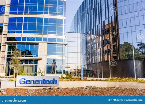 Genentech Sign At Biotechnology Corporation Headquarters Campus Beautiful Landscape. Genentech ...