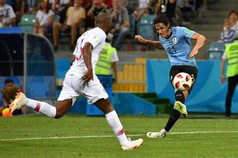 World Cup PIX: Brilliant Cavani brace earns Uruguay win over Portugal