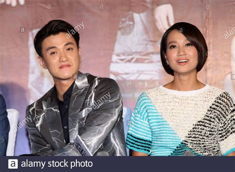 Download this stock image: --File--Chinese actor Zhou Yiwei and his wife, a Chinese actress and ...