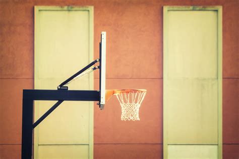 Shallow Focus Photography of Black Metal Outdoor Basketball Hoop · Free Stock Photo
