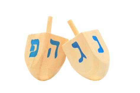 Why Do We Play With a Dreidel (Top) on Chanukah? - Chabad.org