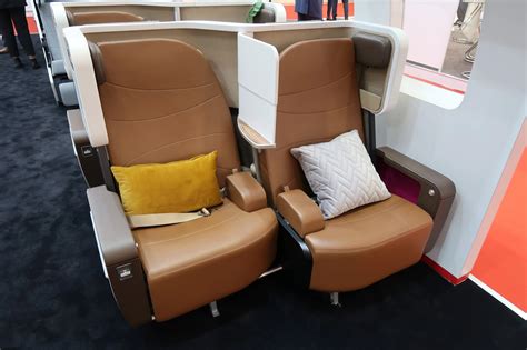 This New Design Turns Premium-Economy Seats Into a Flat Bed