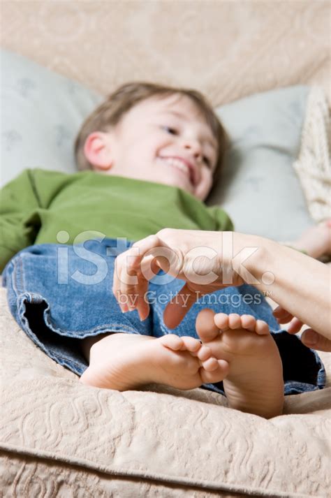 Child Getting Feet Tickled Stock Photo | Royalty-Free | FreeImages