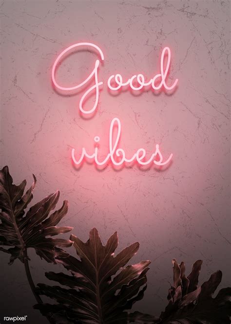 a pink neon sign that says good vibes