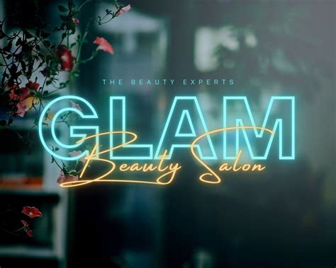 the logo for glam beauty salon is displayed in front of a window with ...