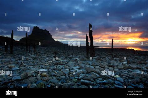 Lindisfarne Castle at sunrise, Northumberland, England Stock Photo - Alamy