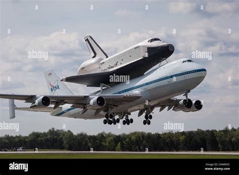 The NASA Space shuttle Enterprise mounted atop a NASA 747 Shuttle Carrier Aircraft takes off ...