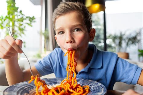 Kids Eating Spaghetti Images - Free Download on Freepik