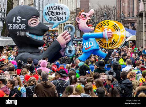 German Carnival parade in DŸsseldorf, Carnival floats designed as political caricatures, IS ...