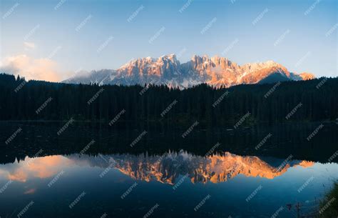 Premium Photo | Panorama of lago di carezza at sunrise