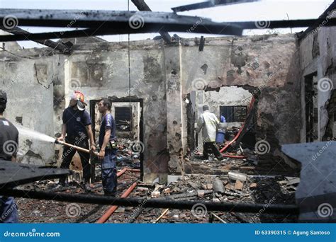 Firefighters Extinguish Fire Burning Home Editorial Image - Image of ...