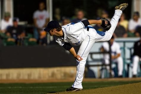 A Baseball Playing Throwing The Ball - H-Wave