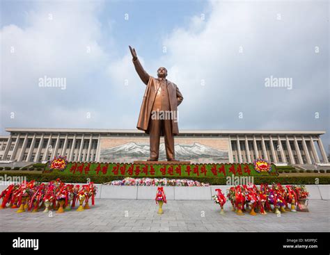 Flowers in front of Kim il Sung statue in Mansudae Grand monument ...