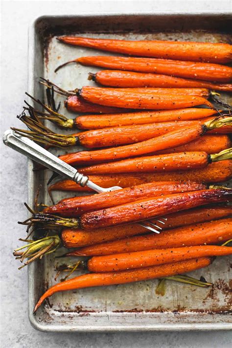 Tender honey brown sugar roasted carrots seasoned and baked to perfection make the perfect ...