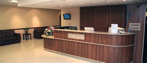 Bespoke Curved Hotel Reception Desks | Elegant Wooden Hotel Counters
