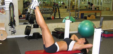 Flat Bench Abdominal Leg Raises - Abs Exercise Guide