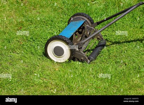 Manual hand grass cutter hi-res stock photography and images - Alamy