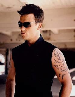 Tattooz Designs: Robbie Williams Tattoos Meanings and Pictures