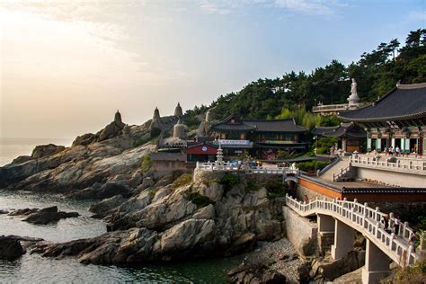 Haedong Yonggungsa Temple at sunrise in Busan, South Korea | Mansions, Sunrise, Travel