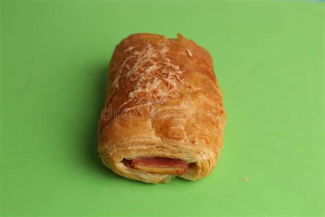 Ham and Cheese Puff Pastry on a Green Surface Stock Photo - Image of meat, cheese: 193740358